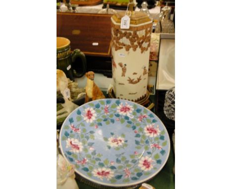 Oriental table lamp and a charger, and a plate in metal stand on feet.