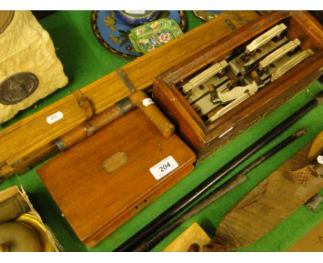 An oak tripod stand, a horn walking stick handle, mahogany box with roller, etc.