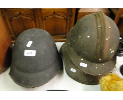 3 Various Army helmets.
