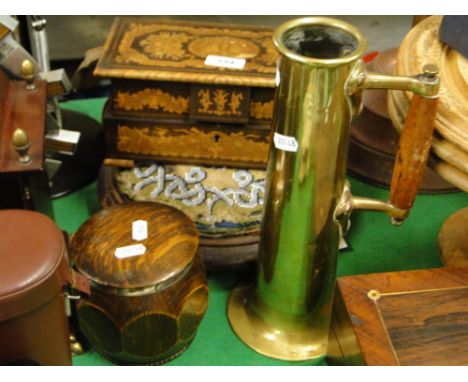 Inlaid jewel casket, a button footstool, tea caddy and a Trench Art vase.