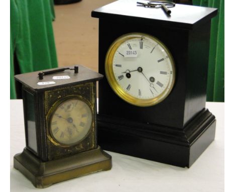 A slate cased 2-train mantel clock and a small brass mantel clock.