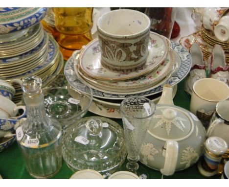 Decanter, teaset and decorative plates.