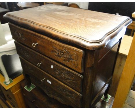 A French carved oak 3-drawer commode.