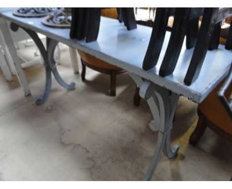 A steel console table with original distressed paint finish.