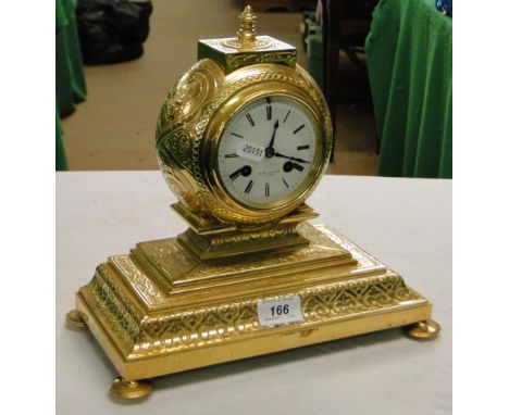 A gilt metal 2-train mantel clock by Henry Bright, Paris.