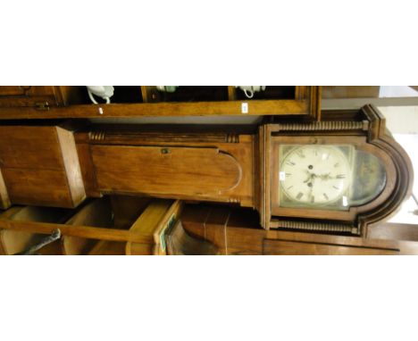 A 19th century 8-day long case clock, with an arched top enamel dial and 2 subsidiary dials, pine cased, height 6'9".
