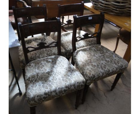 A set of George IV mahogany dining chairs, on ring turned legs.