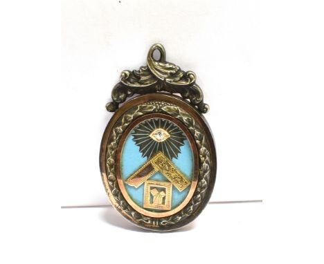 A VICTORIAN MASONIC PRESENTATION JEWEL PENDANT The large oval pendant piece set with an old cut diamond (3.5mm X 3.5mm) on bl
