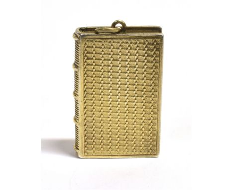 A 19TH CENTURY SILVER GILT VINAIGRETTE  the case of engine turned pattern with book spine edge, vacant rectangular cartouche 