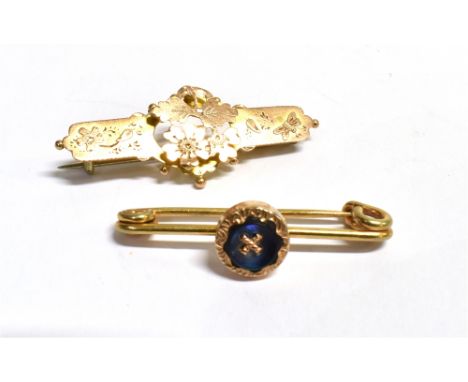 TWO EARLY 20TH CENTURY BROOCHES A 9ct gold bar brooch, with applied and engraved floral design, faded hallmark, C clasp and m