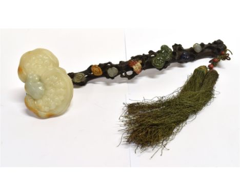 A CHINESE RUYI SCEPTRE of traditional form, with eight jade type carvings mounted on a naturalistically modelled branch, 41cm