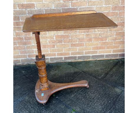 AN EDWARDIAN PATENT OAK OVERBED INVALIDS TABLE  with ivorine plaque for 'CARTERS LTD, INVALID AND SURGICAL FURNITURE MANUFACT