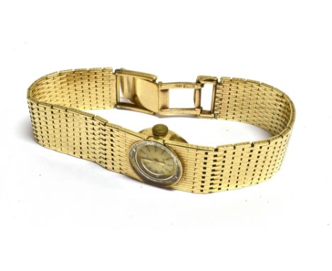 A 9CT GOLD LADIES ROTARY BRACELET WATCH  the circular dial signed Rotary 21 jewels measuring approximately 1.3cm in diameter,