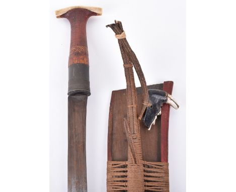 ^ Indian Chopper Dao from the Nagas of Assam, broad single edge pattern welded blade 46cms, wooden hilt partly covered with f