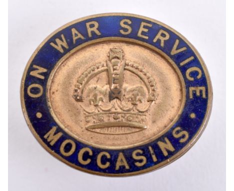 WW1 On War Service Moccasins Lapel Badge, gilt brass oval badge with blue enamel border. Made by J A Restall Birmingham. Good