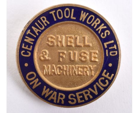 WW1 On War Service Centaur Tool Works Ltd Shell &amp; Fuse Machinery Lapel Badge, gilt brass circular badge with blue enamel 