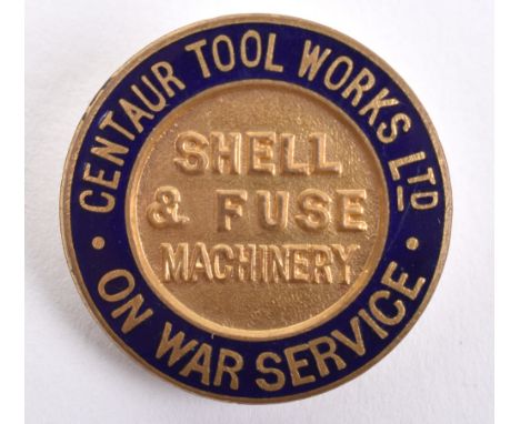 WW1 On War Service Centaur Tool Works Ltd Shell &amp; Fuse Machinery Lapel Badge, gilt brass circular badge with blue enamel 