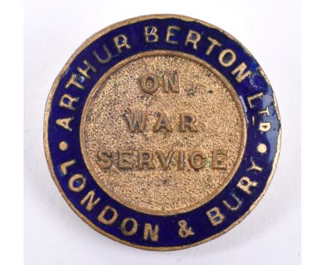 WW1 On War Service Arthur Berton Ltd London &amp; Bury Lapel Badge, gilt brass circular badge with blue enamel border. Un-mar