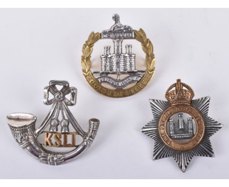 3x British Officers Regimental Cap Badges, consisting of Kings Shropshire Light Infantry two piece silver gilt cap badge with