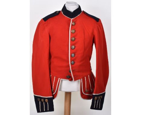 British 1913 Dated Other Ranks Doublet, of scarlet cloth with dark blue facings. White piped front, cuffs and rear skirt. Com