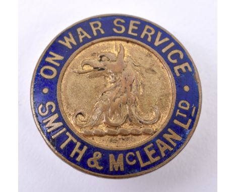 WW1 On War Service Smith &amp; McLean Ltd Lapel Badge, gilt brass circular badge with blue enamel border. Made by W J Dingley