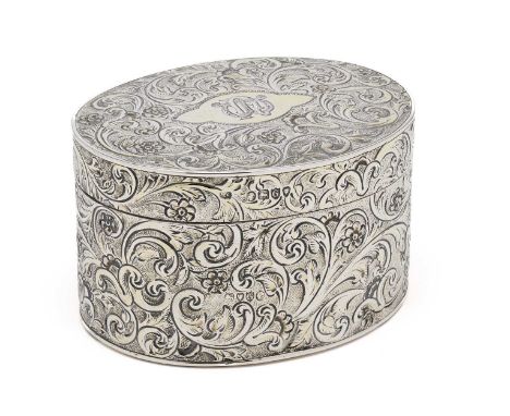 A VICTORIAN SILVER TEA CADDY, WILLIAM COMYNS, LONDON, 1882 showing traces of gilding, oval, covered in foliate scroll and flo