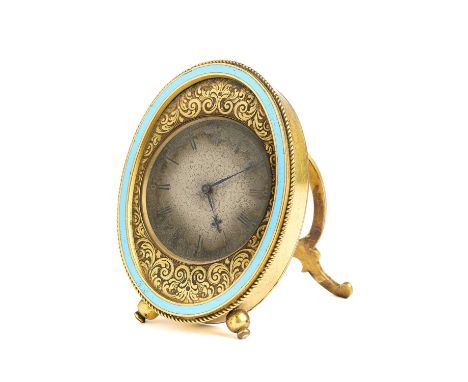 A VICTORIAN GILT-BRASS SMALL STRUT CLOCK, RETAILED BY HENRY RODRIGUES, LONDON, CIRCA 1868 the glazed circular silvered dial w