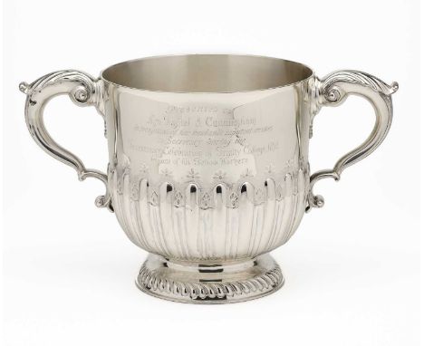 AN IRISH VICTORIAN SILVER PRESENTATION CUP, EDMOND JOHNSON, DUBLIN, 1891  in two-handled late 17th century style, engraved wi