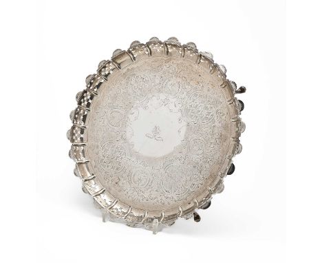 A VICTORIAN SILVER SALVER, HENRY WILKINSON & CO. OF SHEFFIELD, LONDON, 1871 engraved with a crest surrounded by a band of scr