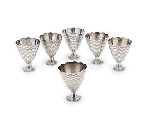 A SET OF SIX SILVER ZARFS, OTTOMAN EMPIRE OR SUCCESSOR STATES, EARLY 20TH CENTURY the conical bowls and short pedestal feet w