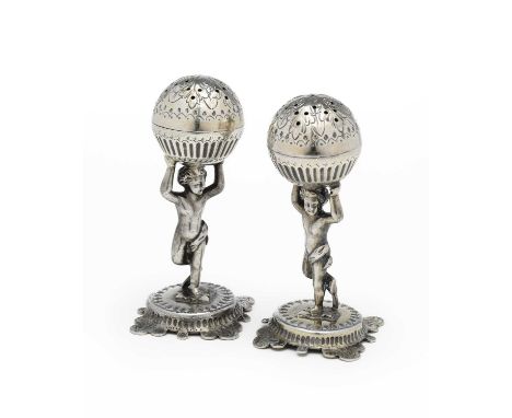 A PAIR OF VICTORIAN SILVER FIGURAL PEPPERETTES, JOHN SEPTIMUS BERESFORD, LONDON, 1878 in Renaissance style, showing traces of