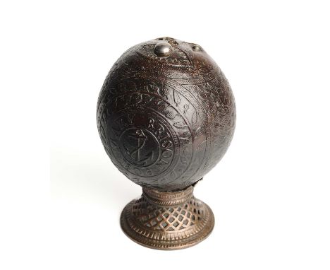 A GEORGE III SAILOR'S 'BUGBEAR' FLASK, DATED 1806  the coconut with all-over low relief decoration of two roundels flanked by