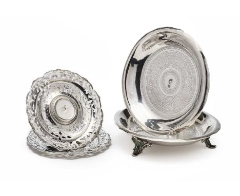 A PAIR OF SILVER STANDS, OTTOMAN EMPIRE, SULTAN ABDULHAMID II PERIOD (1876-1909) circular, the wells and everted rims with co