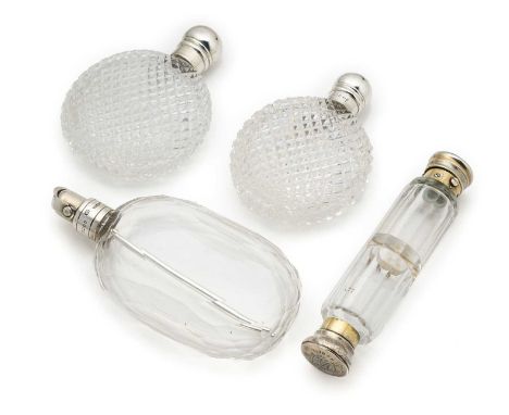 A PAIR OF VICTORIAN SILVER-MOUNTED SCENT FLASKS AND ANOTHER TWO SILVER-MOUNTED SCENT FLASKS, ALL LONDON the pair hob cut flat