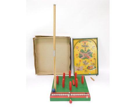 A Chad Valley table skittles game, boxed and a Collingdale table pin ball game. (2)