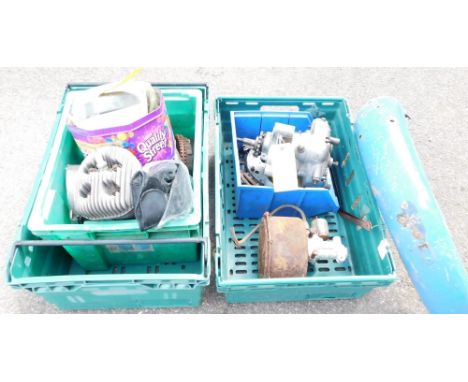 A group of automobile and motorcycle parts, comprising a BSA Bantam motorcycle wheel arch, a BSA engine, BSA gear box, gloves