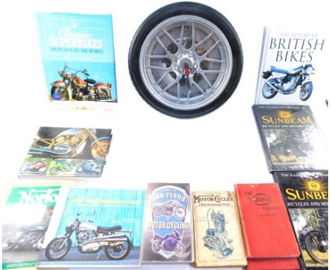 Automobile trinkets and accessories, a car tyre wall clock, 34cm diameter, two Villiers Engine books, a Motorcycle and How to