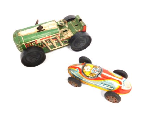 Two tin plate toys, a clockwork tractor lacking key and a friction powered racing car. (2)