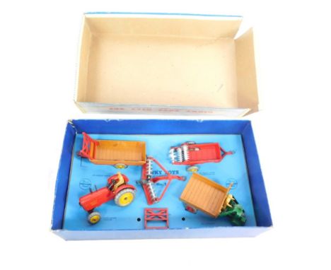 A Dinky Toys Farm Gear gift set, to include tractor and other accessories, partially boxed.