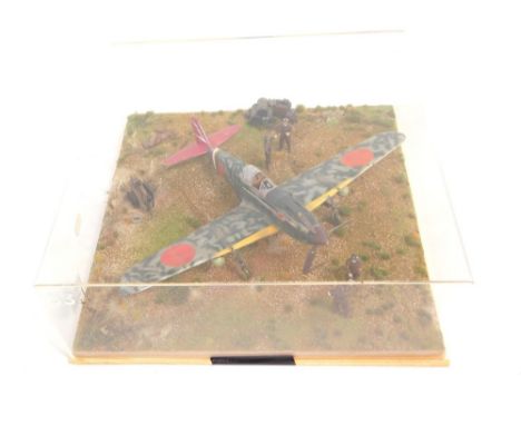 A cased diorama model of a Kawasaki KI61 Tony Hein Fighter, in 1:32 scale. 