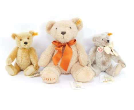 Three Steiff teddy bears, including the Classic teddy bear, 26cm high, teddy bear, 25cm high, and the 2012 Cosy bear. (3) 