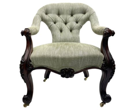 Victorian mahogany framed open armchair, upholstered in buttoned green lozenge pattern fabric, scrolled arm terminals on shap