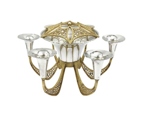 Modernist silver plated candelabra centrepiece by Stuart Devlin, with six pierced gilt branches supporting a central tapering