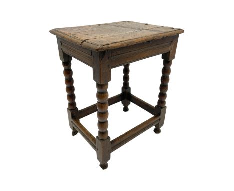 18th century oak joint coffin stool, moulded rectangular top over moulded frieze rails, raised on bobbin turned supports join