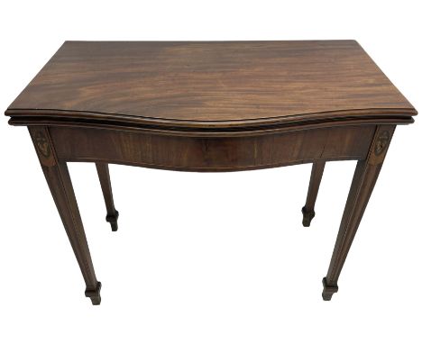 George III inlaid mahogany serpentine card table, the fold-over top with moulded edge supported by gate-leg action, the bande