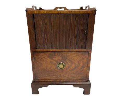 George III mahogany night cabinet commode, the three-quarter raised gallery with pierced handles, above a cupboard enclosed b