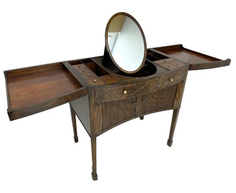 Regency mahogany bow-front dressing table or stand, the top with gadrooned edge hinges to reveal small divided and lidded com