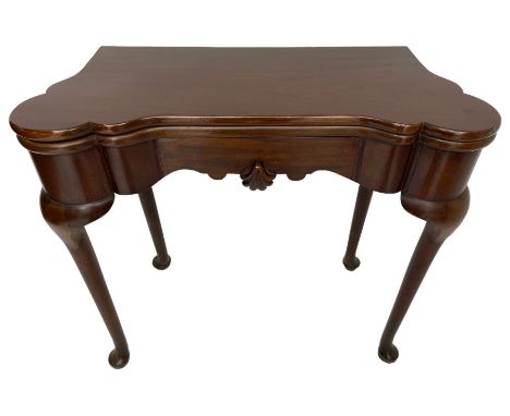 Victorian mahogany card table, the shaped fold-over top reveals baize playing surface and sunken counter wells, the shaped fr