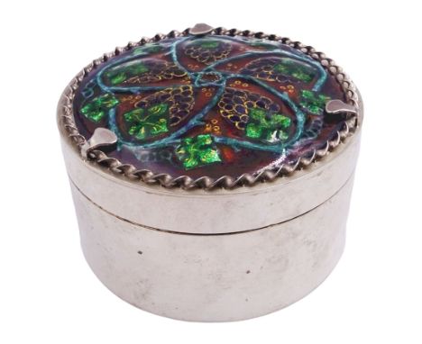 Modern silver box, of circular form, the cover mounted with an an Arts & Crafts enamel panel of a fruiting vine by H G Murphy