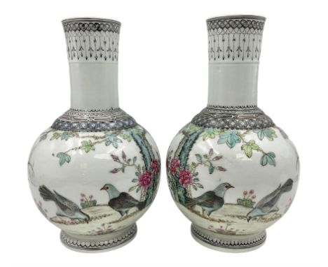 Pair of Chinese Republic porcelain vases, each painted in Famille Rose enamels with pairs of pigeons amidst peony, rock, flow